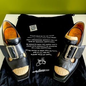 Authentic John Fluevog with adjustable buckle to fit any width.